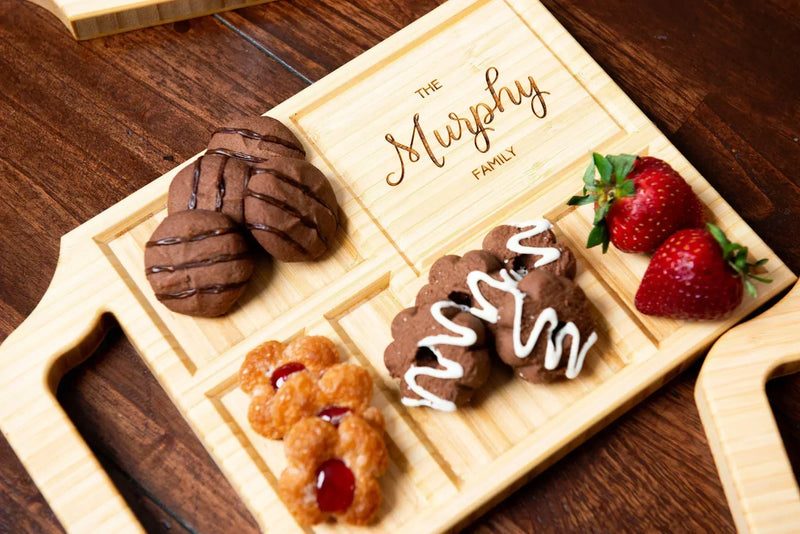 A custom charcuterie board with a variety of snacks