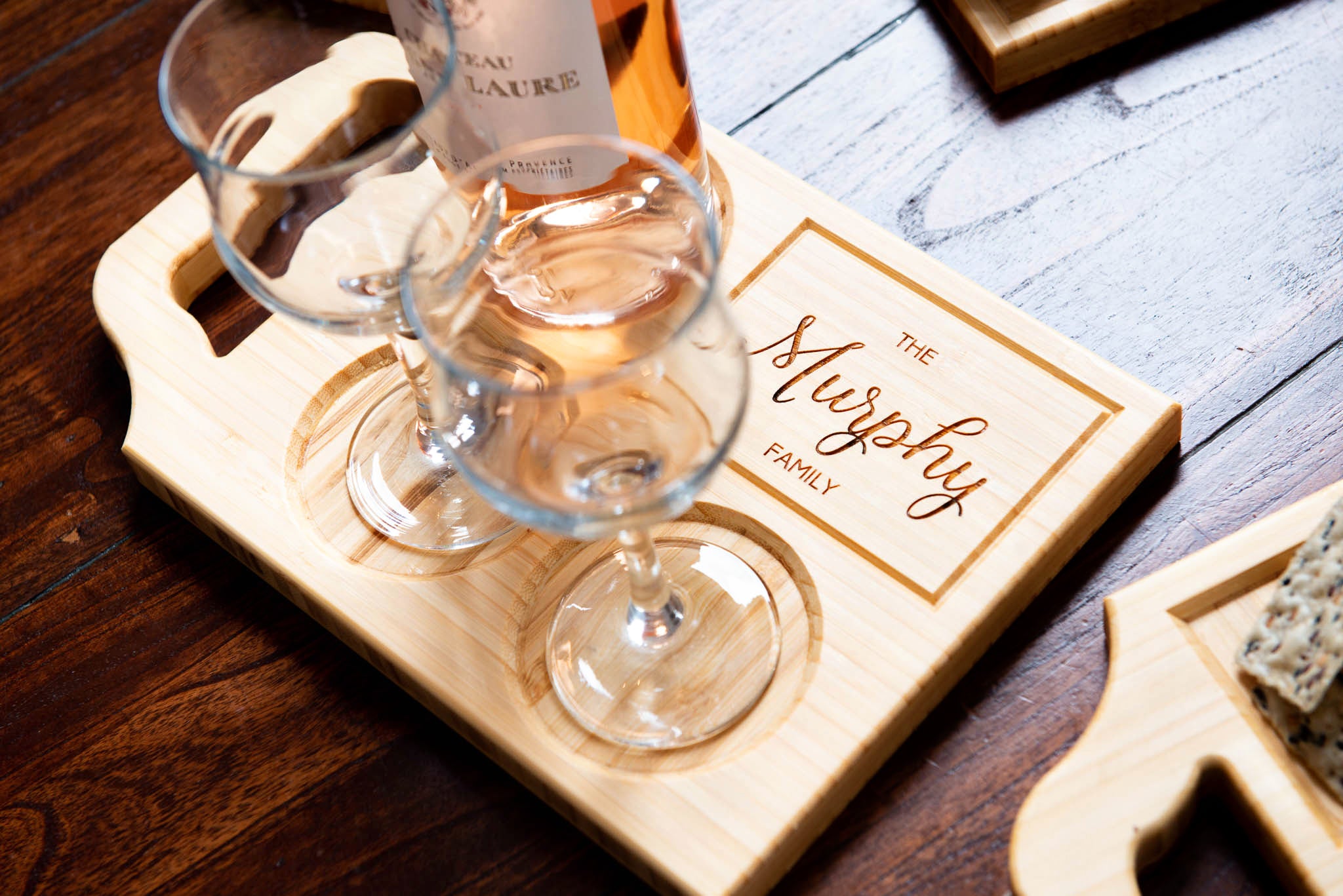 A custom wine board with one handle and engraving