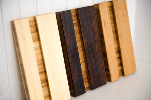 Cutting board stands in each color lined up in a row